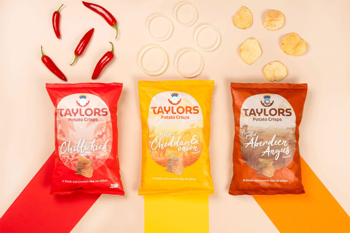 Pack shots of Taylors Snacks crisps including Chilli Kick, Mature Cheddar & Onion as well as Flame Grilled Aberdeen Angus.