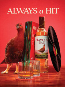 Advert for the returning The Famous Dad bottles from The Famous Grouse with the eponymous grouse sitting next to a record collection, a bottle of The Famous Dad as well as a vinyl record. Two glasses with whisky sit in front of them all with text reading Always a Hit.