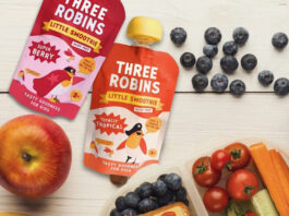 Three Robins expands into Smoothies Two packs of the new Three Robins oat milk Smoothie pouches sit on a table with fruit and vegetables around them.