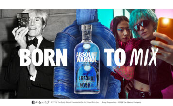 Advert for Absolut Warhol with a picture of the bottle at the centre with a photo of Andy Warhol to the left and a photo of two friends taking a selfie to the right, the text reads Born to Mix.