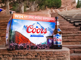 Win a trip to Colorado with new Coors promo A pack of Coors lager sits on a rock step with a bottle of Coors lager to its side with red rock steps in the background.