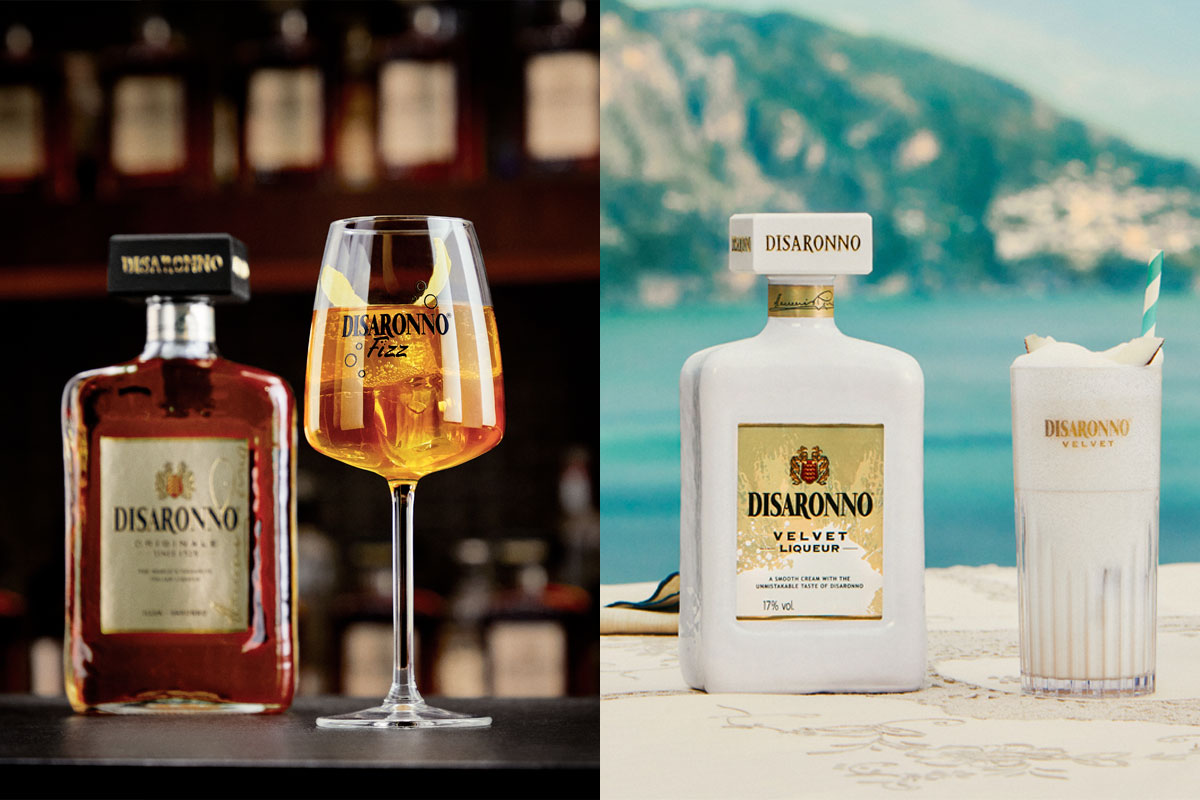 Cocktails serves stand next to bottles of Disaronno Originale and Disaronno Velvet with the Originale variant in a bar and Velvet cocktail against a summer holiday backdrop.