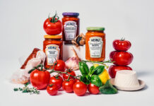 Jars of Heinz Pasta Sauce are surrounded by ingredients used in making each of the sauces, the Pasta Sauces including Tomato, Sicilian Lemon and Ricotta; Tomato, Black Garlic and Roasted Garlic; and Tomato & Spicy 'Nduja.