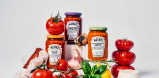 Jars of Heinz Pasta Sauce are surrounded by ingredients used in making each of the sauces, the Pasta Sauces including Tomato, Sicilian Lemon and Ricotta; Tomato, Black Garlic and Roasted Garlic; and Tomato & Spicy 'Nduja.