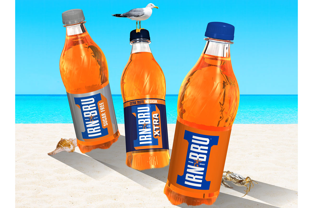 Promotional image for Irn-Bru's summer competition featuring bottles of Irn-Bru, Diet Irn-Bru and Irn-Bru XTRA on a beach.