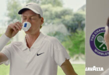 Jannik Sinner drinks from a Lavazza branded espresso cup with the Wimbledon logo behind him and the Lavazza logo in the bottom right corner.