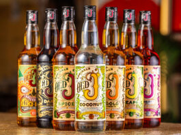 Old J Rum rolls out new Coconut variant Bottles of Old J Rum range are lined up with a bar background.