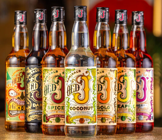 Old J Rum rolls out new Coconut variant Bottles of Old J Rum range are lined up with a bar background.