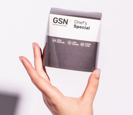 GSN has a Chef’s Special straight from the kitchen A person holds a pack of GSN Chef's Special frozen chicken meal.