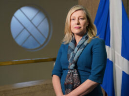 Circular Economy Bill receives public backing Gillian Martin, acting net zero secretary, stands in Scottish Parliament with the Scotland flag behind her.
