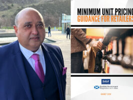 SGF publishes retailer guide to MUP Pete Cheema, chief executive of the SGF stands outside Scottish Parliament with an image of the SGF Guide to MUP 2024 next to him.