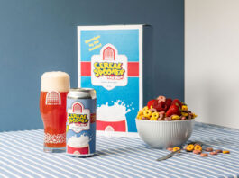 Vault City brings a bowlful of flavour with cereal milk beer A can of Vault City Cereal Spooner sour beer stands in front of a cereal box advertising the sour beer with it poured out in a Vault City branded glass and a bowl of cereal and fruit to the right.