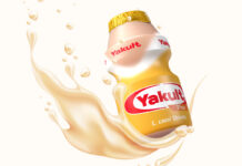 Promotional image of Yakult Plus Peach with a bottle of the drink surrounded by the liquid.