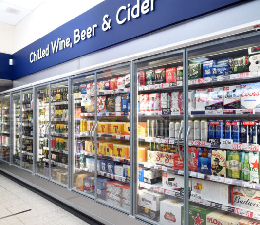 Alcohol prices fall in latest ONS inflation data Picture of a convenience store's alcohol section.