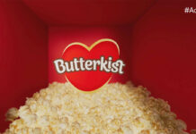 TV ad for Butterkist featuring a pile of popcorn in a red room with the Butterkist logo in the centre.