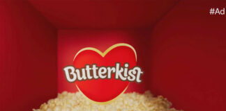 TV ad for Butterkist featuring a pile of popcorn in a red room with the Butterkist logo in the centre.