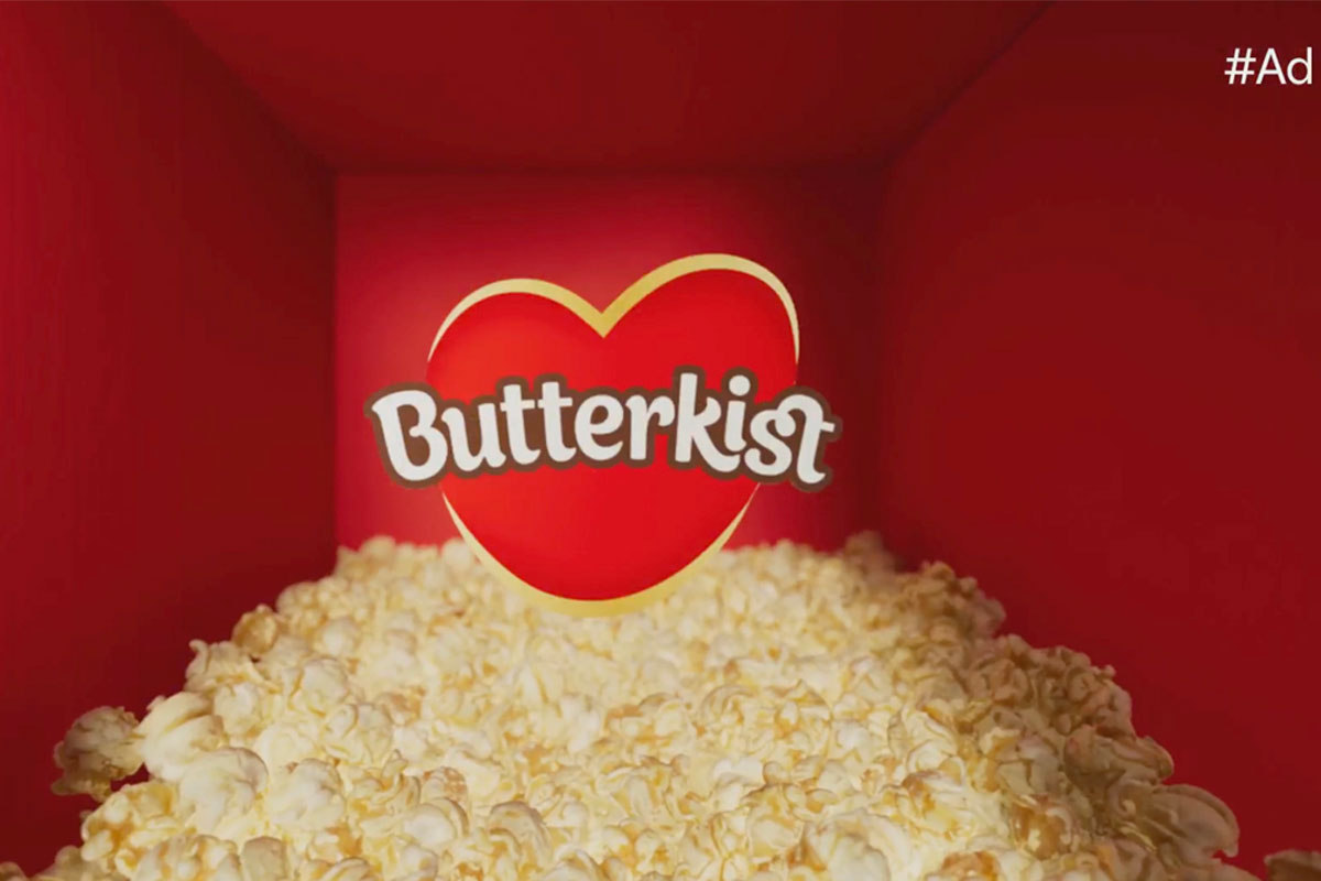 TV ad for Butterkist featuring a pile of popcorn in a red room with the Butterkist logo in the centre.