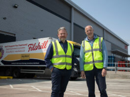 JW Filshill records strong financial results Simon Hannah, group chief executive officer at JW Filshill,(left) and Keith Geddes, chief financial and operating officer, (right) stand in front of the JW Filshill depot with one of the wholesaler's HGV vehicles behind them.