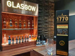 Experimenting with tradition at the Glasgow Distillery The Glasgow Distillery meeting room with a pack of Glasgow 1770 Tokaiji Cask Finish in front with a nosing glass next to it.
