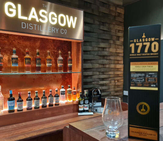 Experimenting with tradition at the Glasgow Distillery The Glasgow Distillery meeting room with a pack of Glasgow 1770 Tokaiji Cask Finish in front with a nosing glass next to it.