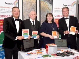 Changes ahead for GroceryAid Scotland Members of the GroceryAid Scotland board stand at a table at the Scottish Grocer Awards 2022 to raise funds for the charity.