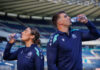 Rugby Union players Emma Wassell and Sam Skinner both drink from Highland Spring bottles in the middle of Murrayfield Stadium.