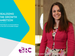SRC sets out Scottish budget retail support hopes Front cover of SRC's Realising the Growth Ambition: Retail industry recommendations for the 2025-26 Scottish Budget with an aimge of Kate Forbes standing in Scottish Parliament.