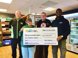 Asda Foundation funds Scottish foodbanks this winter An Asda Foundation staff member presents The Courtyard Pantry Foodbank with a cheque for £1,000.