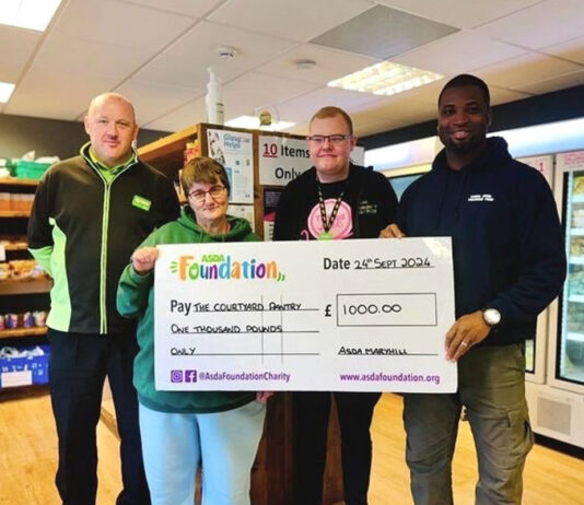Asda Foundation funds Scottish foodbanks this winter An Asda Foundation staff member presents The Courtyard Pantry Foodbank with a cheque for £1,000.