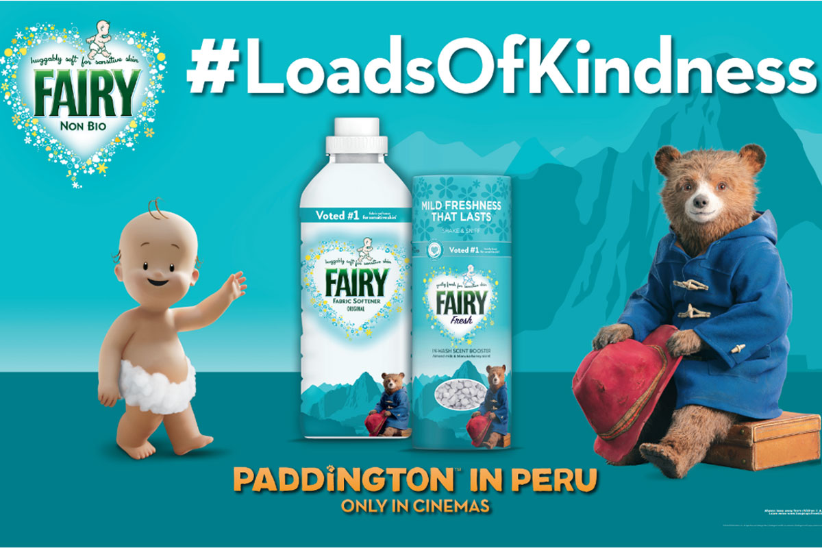 Promotional image of the collaboration between Fairy Non Bio and Paddington in Peru, featuring new limited edition packs with the Paddington character and Fairy Baby character with text that reads #LoadsOfKindness.