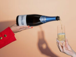 Success for Hambledon wine A person pours of a bottle of Hambledon sparkling wine into a glass which a person is holding.