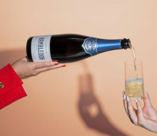Success for Hambledon wine A person pours of a bottle of Hambledon sparkling wine into a glass which a person is holding.