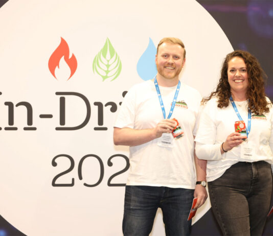 In-Drinks kicks off Catalyst competition L-R Joe Harris, Lonkero and Paige Gibbons, Lonkero both stand in front of the In-Drinks logo holding cans of Lonkero.