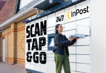 A woman accesses lockets at an InPost Locker site.