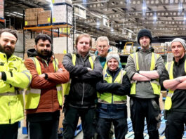 Mark Murphy Dole cuts down on food waste Staff members at Mark Murphy Dole in Edinburgh stand in the warehouse folding their arms.