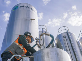 A person working at a silo at the MiAlgae production facility.