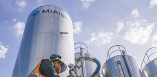 A person working at a silo at the MiAlgae production facility.