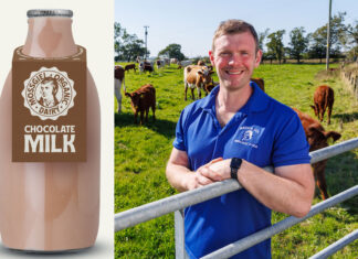 Bryce Cunningham, founder of Mossgiel Farm, stands in a field with cows behind him with a pack shot of a Mossgiel Dairy Farm Chocolate Milk bottle.