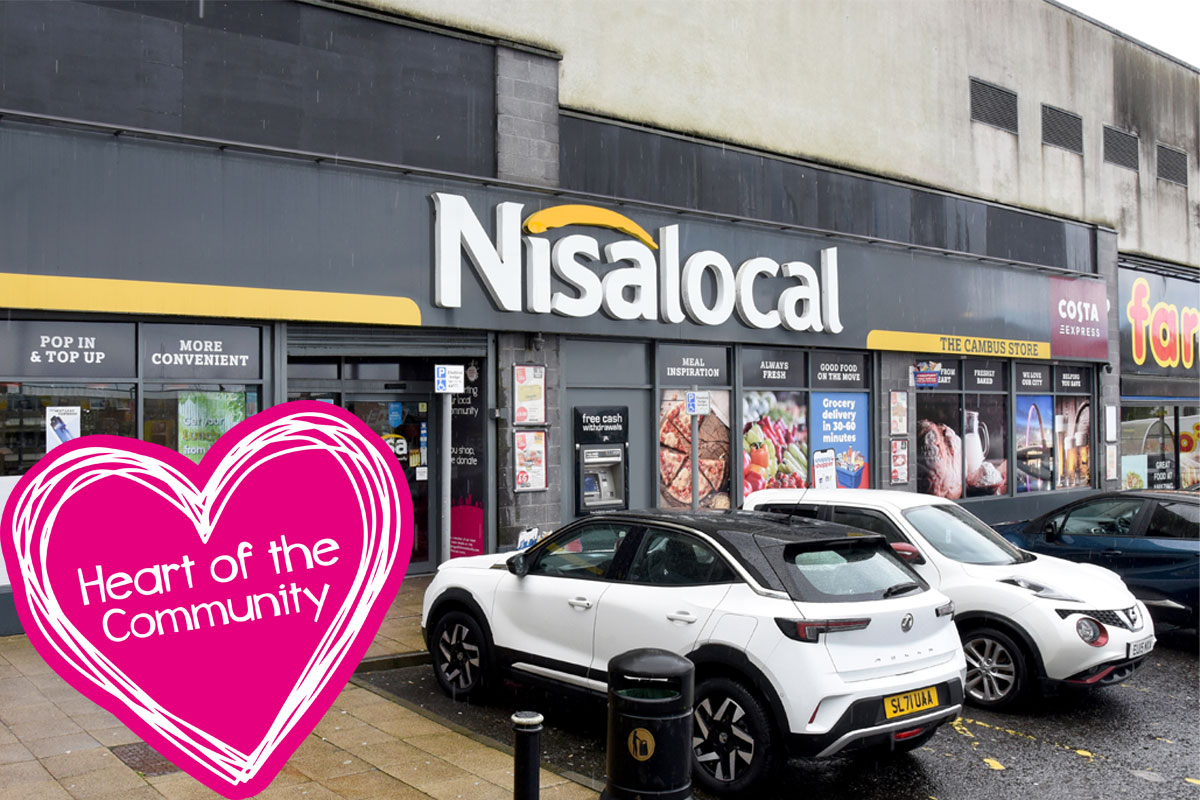 Image of a Nisa Local storefront in Cambuslang with cars parked out front and the Nisa Making a Difference Locally charity Heart of the Community logo to the side.