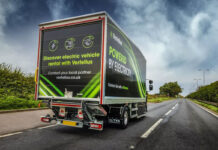 Renault Vertellus electric vehicle truck drives down a road with a dark sky.