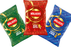 Festive pack designs for Walkers crisps in 2024 featuring Salt & Vinegar, Ready Salted and Cheese & Onion.