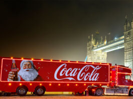 Holidays are coming with Coca-Cola The Coca-Cola Christmas Truck for 2024 season is in front of Tower Bridge during the night.