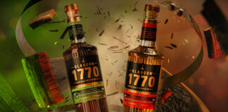 Bottles of Glasgow 1770 Cask Strength crash through a whisky cask with red and green lighting.