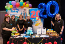 The Healthy Living Programme team celebrates the 20th anniversary at the Scottish Grocers' Federation conference.