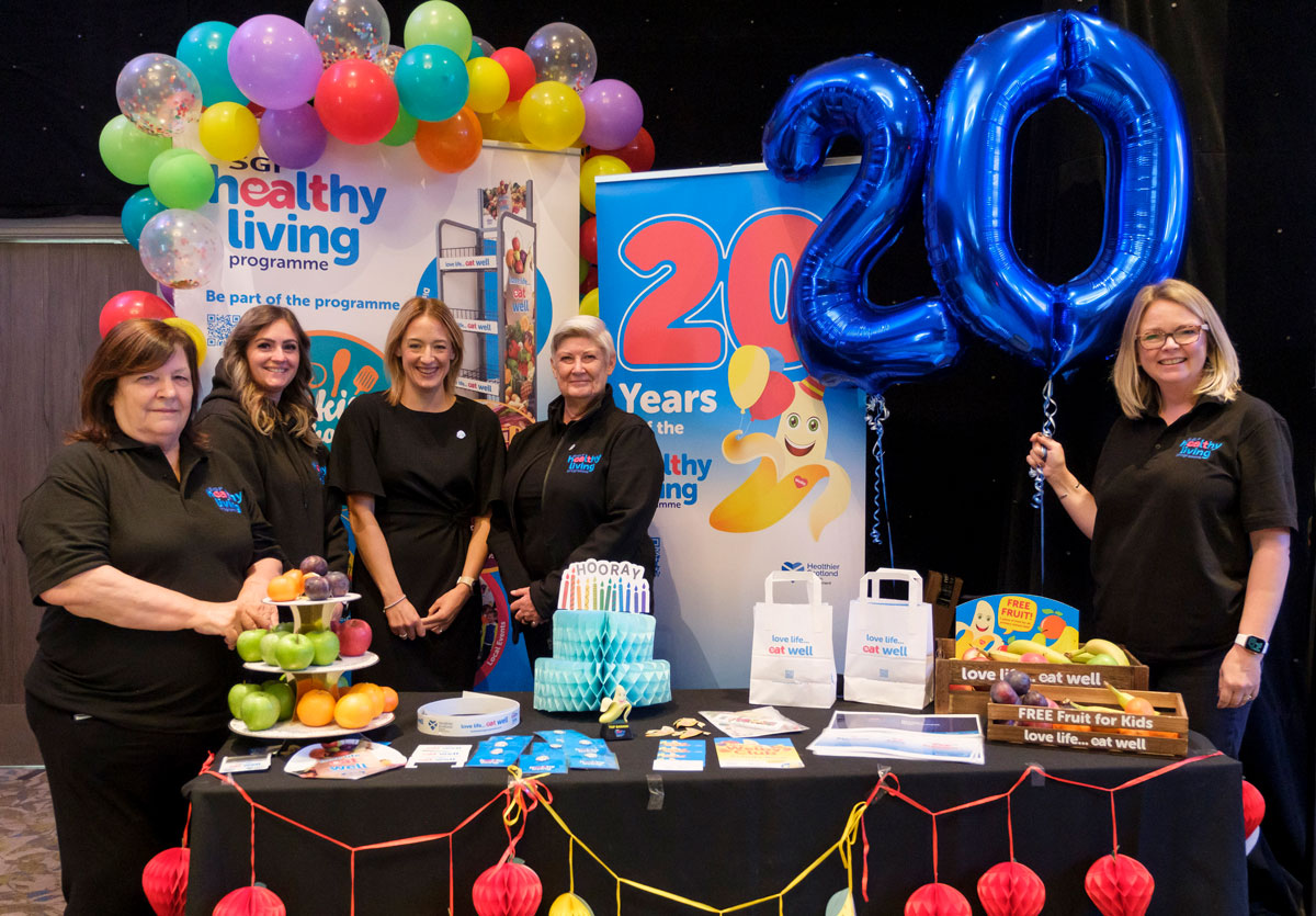 The Healthy Living Programme team celebrates the 20th anniversary at the Scottish Grocers' Federation conference.