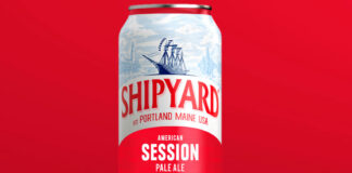 A can of Shipyard American Pale Ale is against a red background.