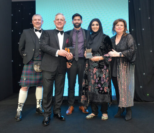 The main stars of the Scottish Grocer Awards 2024 Asiyah and Jawad Javed are congratulated by editor Giles Blair, Republic Technologies sales and marketing director Gavin Anderson and Elaine C Smith.