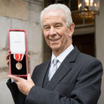 Former Walker’s Shortbread director Jim Walker dies Sir Jim Walker accepting his knighthood from the King in 2022.