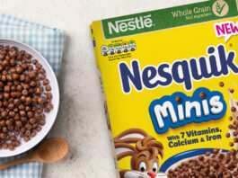 Nesquik rolls out some Minis fun A cereal box of Nesquik Minis sits on table with a bowl filled with the cereal and a spoon next to the bowl.