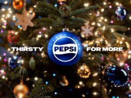 Pepsi kicks off Christmas campaign A Christmas tree with a blue bauble hanging from its branch with the Pepsi logo on it and surrounding text that reads "Thirsty For More".